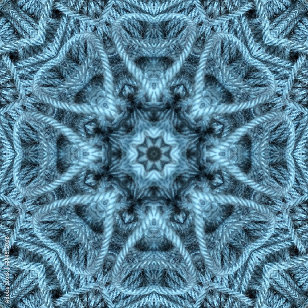 blue yarn for knitting and crochet seen through kaleidoscope lens with heart shapes blue yarn for knitting and crochet seen through kaleidoscope lens with heart shapes