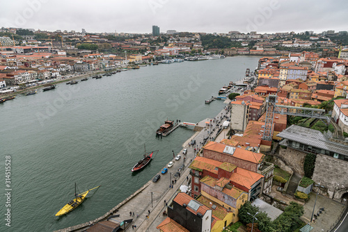 Porto old town riverside aerial promenade in Portugal. Picturesque old houses among the Douro River