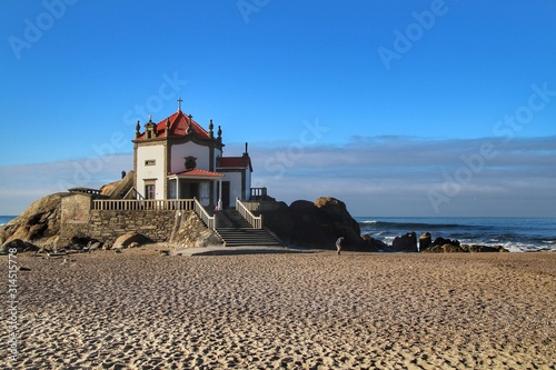 Beautiful chapel in the sea called Senhor da Pedra in Porto