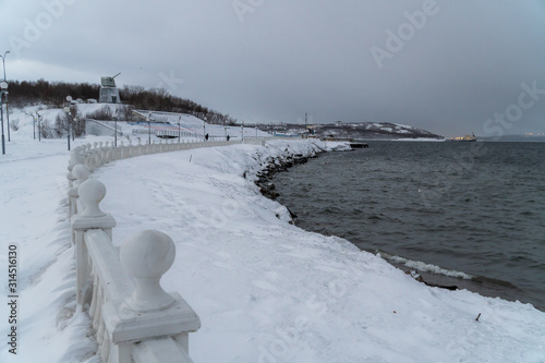 Winter views of the embankment of the city of Severomorsk.