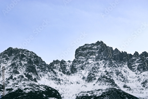 triangle shaped snow cap mountain in the Polish Tatrah