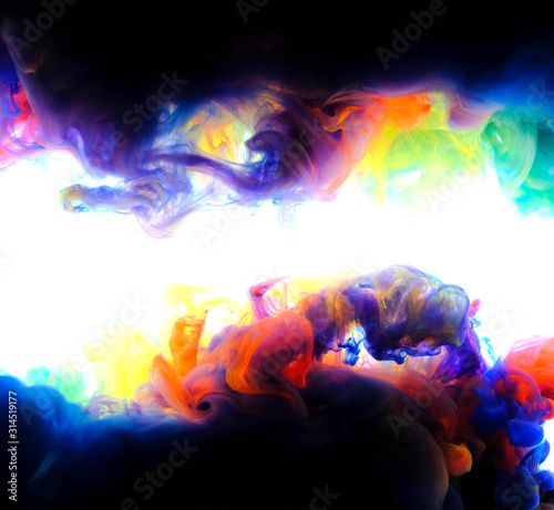 Color paint drops in water , abstract color mix , drop of Ink color mix paint falling on water Colorful ink in water, 
