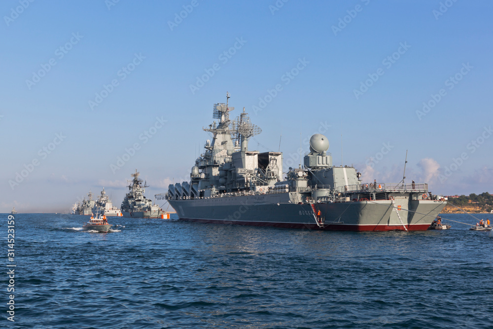 Raid boat RK-1494 bypasses the formation of warships in the Sevastopol Bay, Crimea