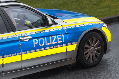 modern german police car on the road photo