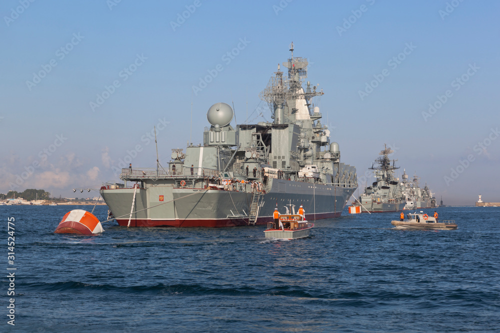 Raid boat RK-1494 approached the Moscow missile cruiser at a rehearsal of the Navy Day parade in Sevastopol Bay, Crimea