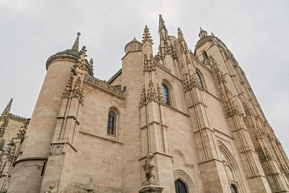 Low angle view of the old church of Segovia, Spain. Great perspective of this Catholic Church in Spain