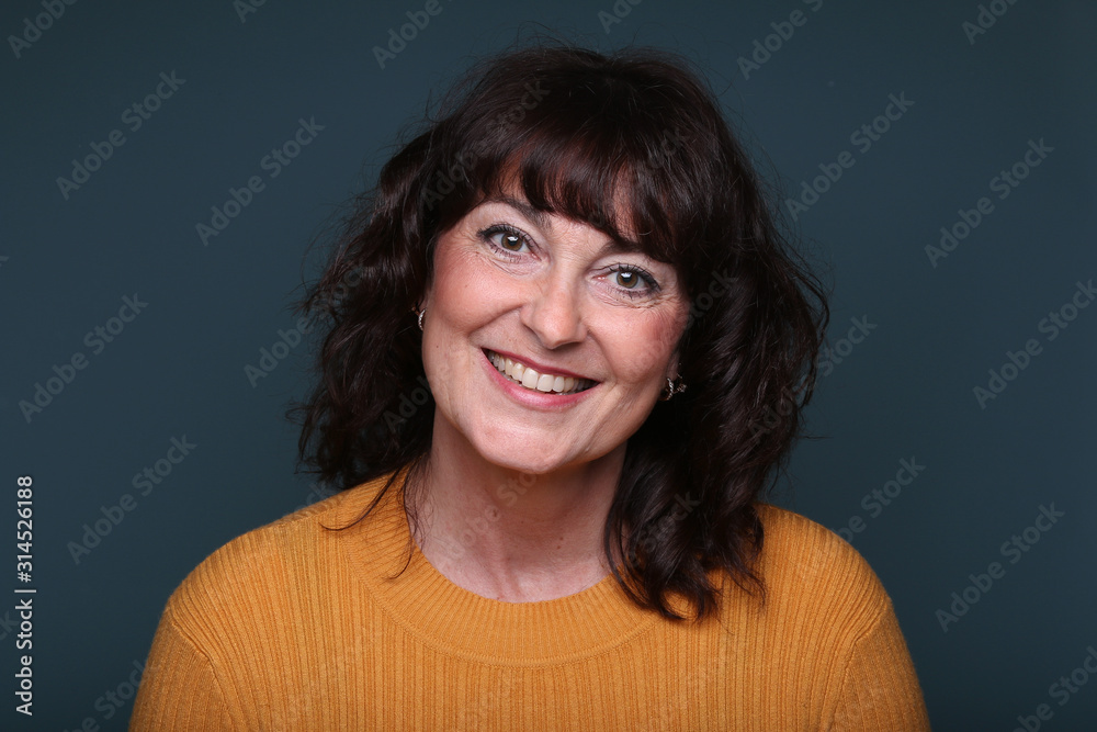 Beautiful woman in front of a background Beautiful woman in front of a background