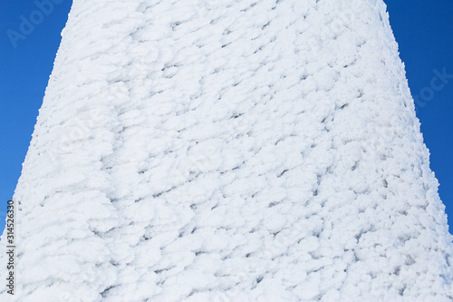 winter background with snow texture closeup. Lattice
