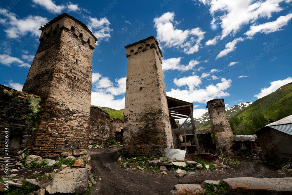 Svan towers in Ushguli village, Svanetia green region in Georgia - Caucasus mountains