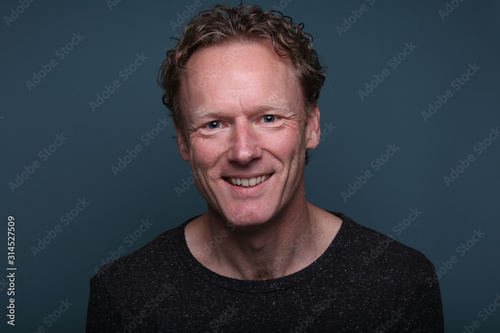 Beautiful man in front of a background Beautiful man in front of a background