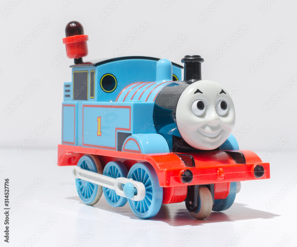 londonm england, 05/05/2019 A plastic thomas the tank engine train toy  isolated on a white studio background. Children plastic toys made in china.  steam and coal engine trains. Stock Photo | Adobe Stock