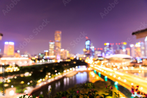 Blur Focus. Singapore Downtown Core at night with reflection in the river