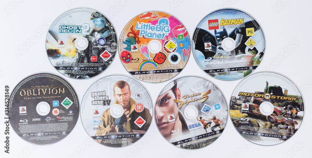 london, england, 08/05/2018 A large pile stack of used playstation 3 ps3  video game cases and dvd games. Microsoft xbox 360 home arcade system video  games. Stock Photo | Adobe Stock