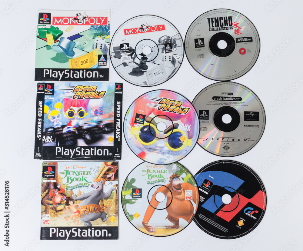 london, england, 08/05/2018 A large pile stack of used playstation 1 ps1  video game cases and dvd games. Microsoft xbox 360 home arcade system video  games. Stock Photo | Adobe Stock