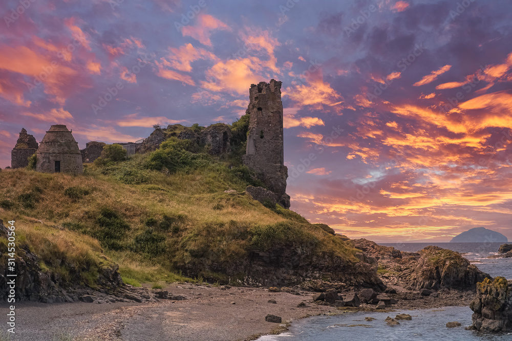 Fototapeta premium Dunure castle Ruins and Rugged Coast Line late afternoon
