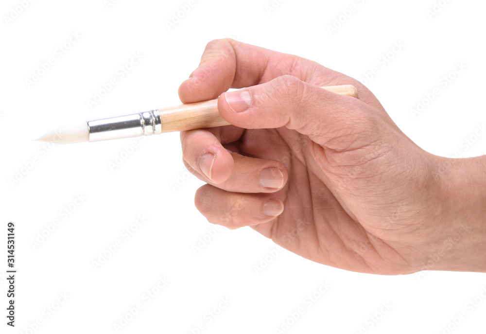 Paintbrush in hand Paintbrush in hand