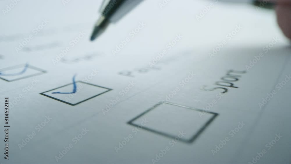 Person Ticks Checkbox Marks with a Pen, filling up To Do List. Checking Marks and FIlling in a Task List / Questiannaire / Medical Cart. Moving Macro Close-up Camera Person Ticks Checkbox Marks with a Pen, filling up To Do List. Checking Marks and FIlling in a Task List / Questiannaire / Medical Cart. Moving Macro Close-up Camera
