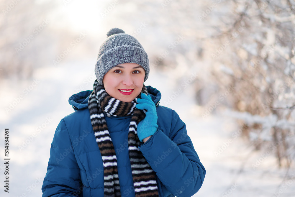 portrait of a young happy girl woman in winter clothes portrait of a young happy girl woman in winter clothes