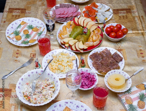 Table with food for the holiday with fruit salads and drinks