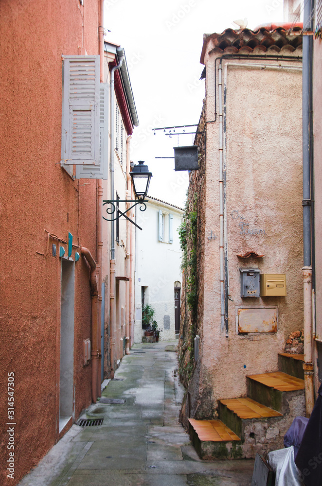 Fototapeta premium Typical colorful street in Menton, France