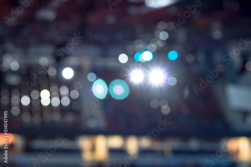 no focus, blurry. Soft focus. Professional arena for sports. Bright light spotlights.