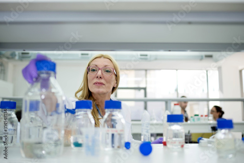 Laboratory scientist researching chemical compositions