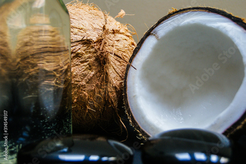 coconut, massage, sand, oil, coconut oil, obsidian, rocks, hot stones, alternative therapies, relaxation, meditation, decoration, interior, fruits, sea, beach, bottle, glass,