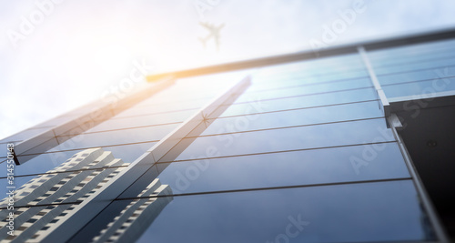 Fototapeta Naklejka Na Ścianę i Meble -  Airplane above business city . Mixed media