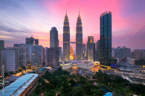 Kuala lumpur skyline at dusk, Cityscape of kuala lumpur city the center of business. photo
