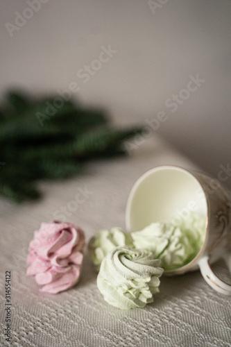 green  pink  marshmallows in a cup  herringbone-shaped cake