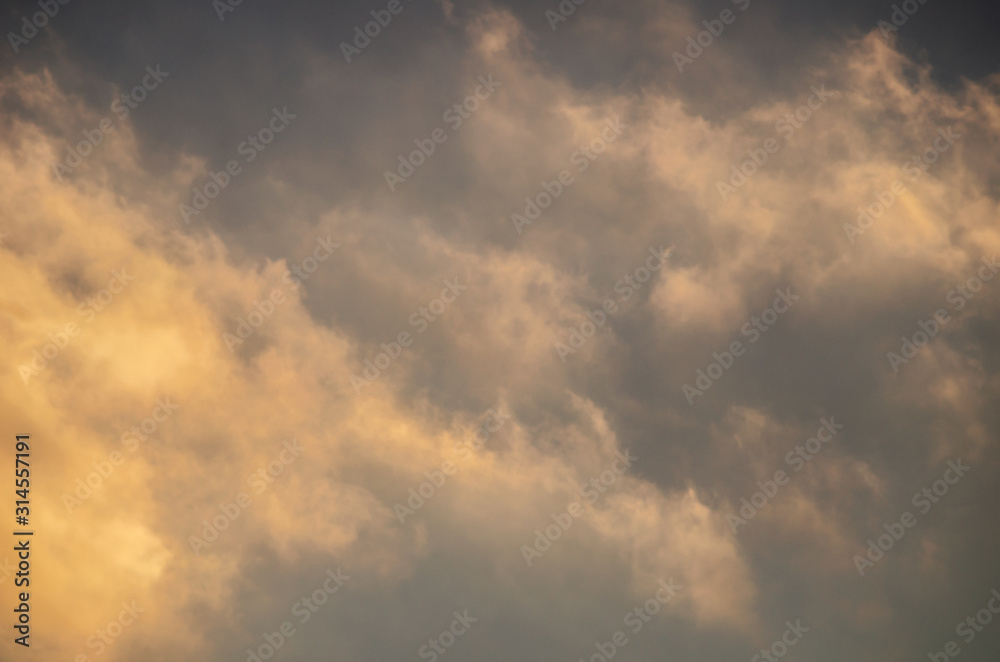 background with cumulus clouds in sunset pink color