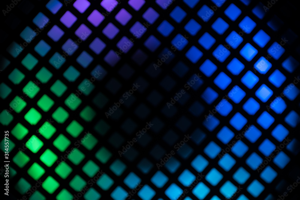 Abstract Macro close up of bright lights seen across a grid Abstract Macro close up of bright lights seen across a grid