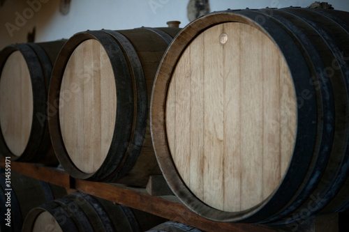 wine barrels in a warehouse