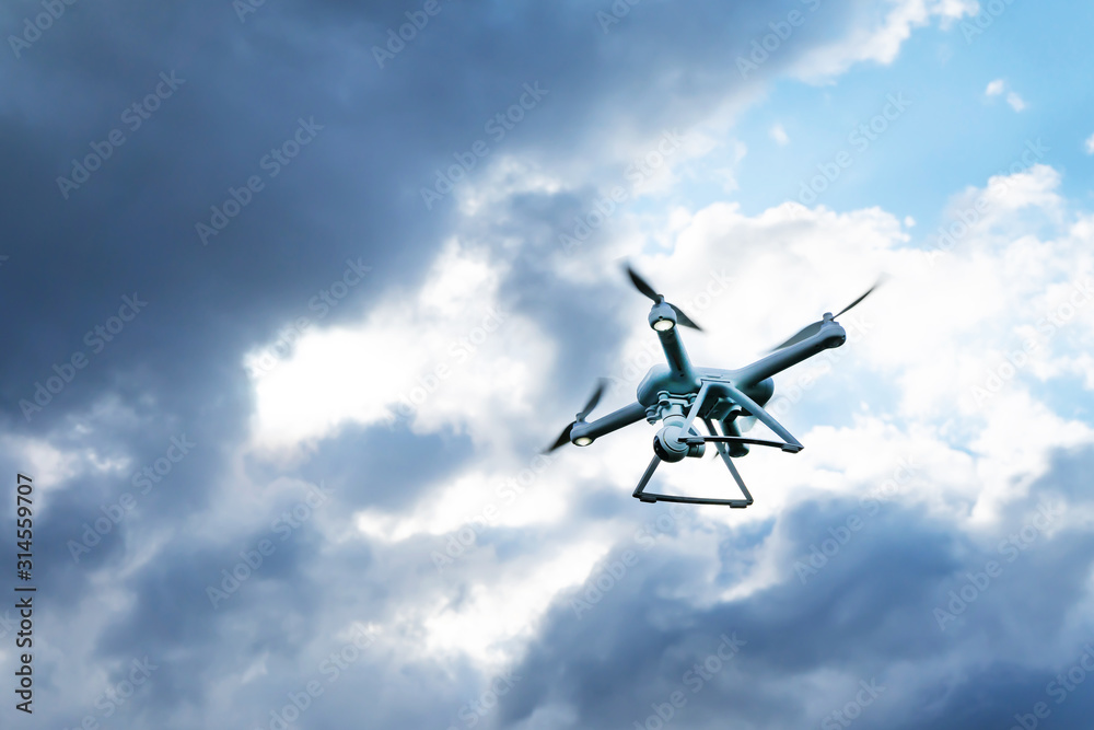 Close up Drone flying a cloudy sky Close up Drone flying a cloudy sky