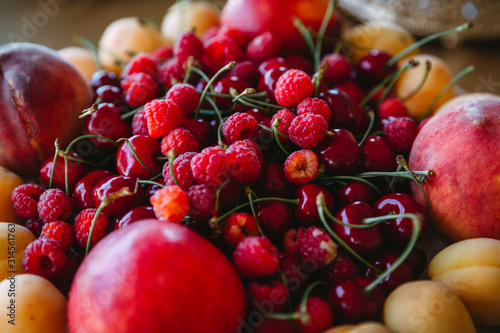 Fresh and juicy forest berries of blackberries, raspberries