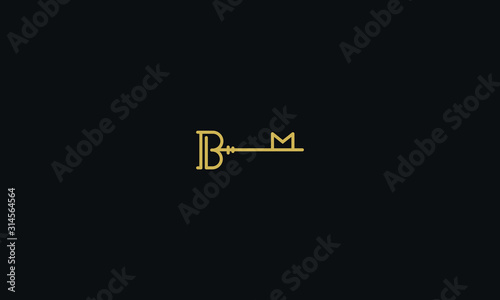 Alphabet letter monogram icon logo  BM making a unique KEY photo