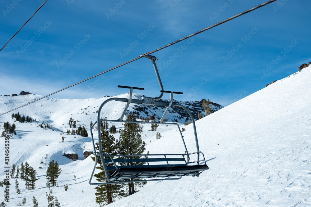 Empty ski lift on mountain, Kirkwood resort, California, USA January 4, 2020 Empty ski lift on mountain, Kirkwood resort, California, USA January 4, 2020