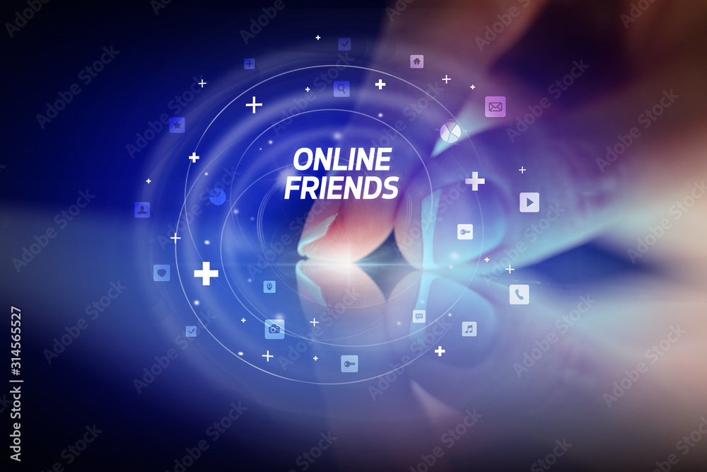 Finger touching tablet with social media icons and ONLINE FRIENDS Finger touching tablet with social media icons and ONLINE FRIENDS