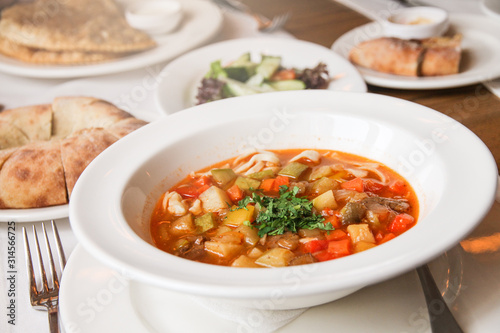 Tasty soup with lamb and vegetables. Eastern culture.