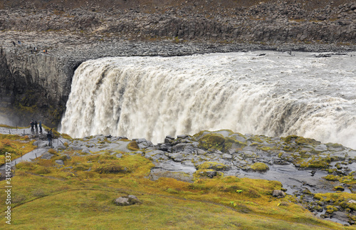 Amazing Iceland landscape at Dettifoss waterfall in Northeast Iceland region. Dettifoss is a waterfall in Vatnajokull National Park reputed to be the most powerful waterfall in Europe. photo