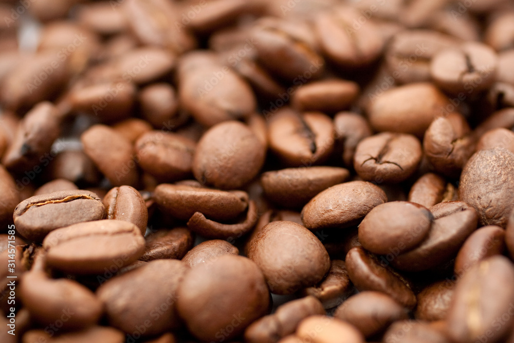 Close up shot of coffee beans on white background Close up shot of coffee beans on white background