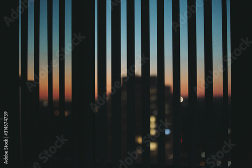 Sunset through blinds © Sifan