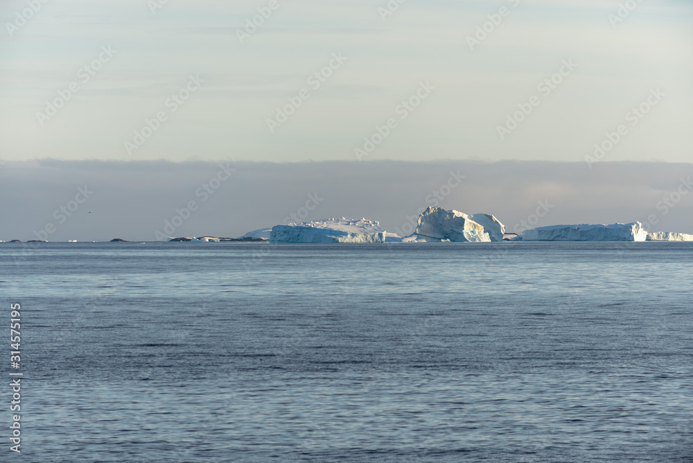Antarctic landscape with iceberg at sea Antarctic landscape with iceberg at sea