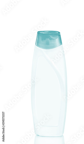 White shampoo bottle on a white background. Healthy scalp care. Concept of beauty.