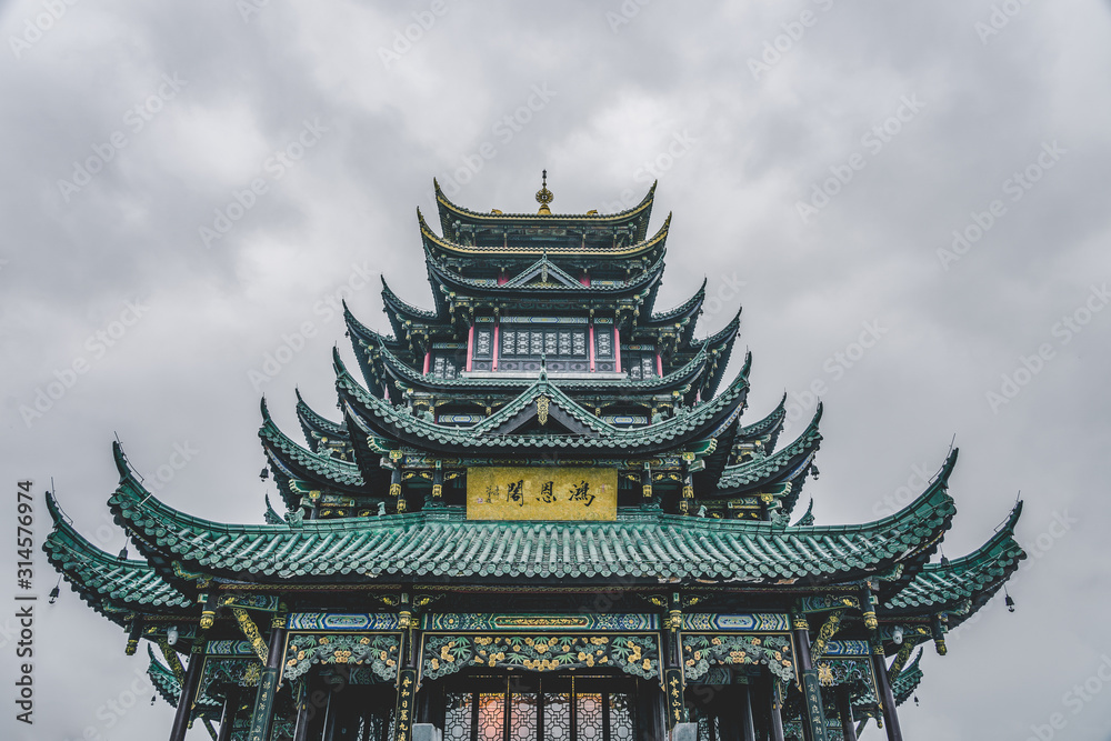Ancient Hong'En Temple pagoda tower with green tile under overcast weather in Chongqing, Southwest China metropolis Ancient Hong'En Temple pagoda tower with green tile under overcast weather in Chongqing, Southwest China metropolis