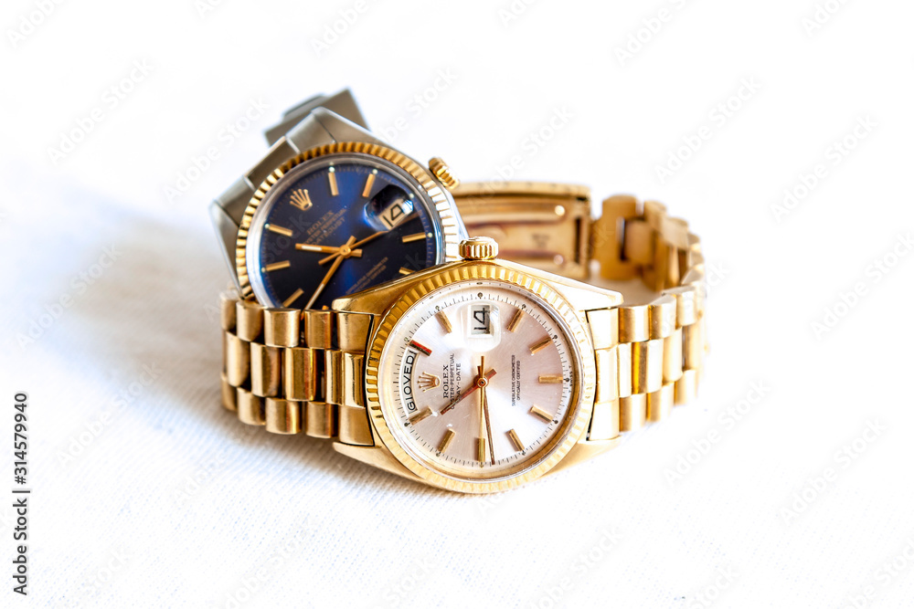 Rolex Oyster Perpetual Day- Date and Oyster Blue watch on white background  foto de Stock | Adobe Stock