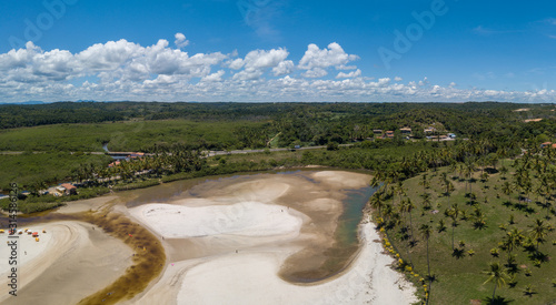 Aerial drone view of Cururupe beach in Ilhéus city, Bahia, Brazil photo