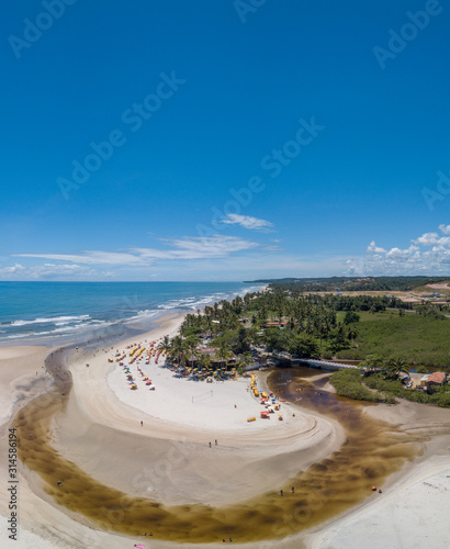 Drone aerial view of beach Cururupe in the city of Ilheus, Bahia, Brazil. photo