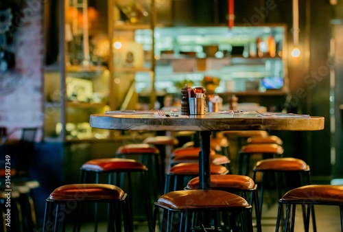 Photography Inspired by Steampunk design, distressed leather bar stools and vista of service
