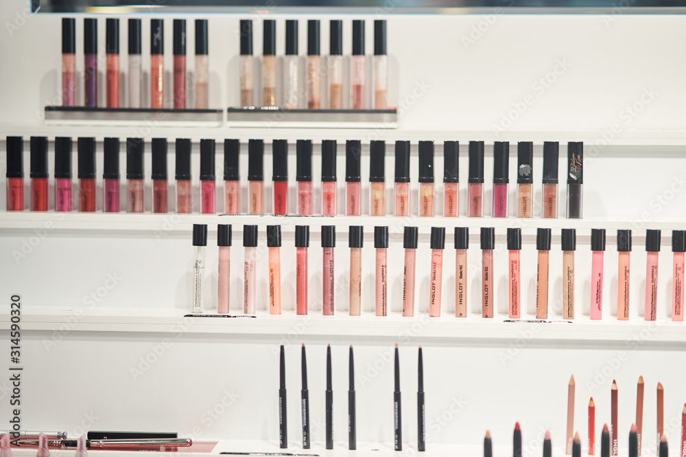 Kaliningrad, Russia - 25 December 2019: Multi-colored lip glosses in the store. Professional makeup for makeup artist Kaliningrad, Russia - 25 December 2019: Multi-colored lip glosses in the store. Professional makeup for makeup artist